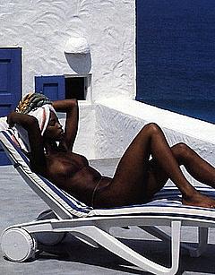 Naomi Campbell sunbathing nude