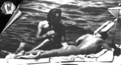 Romy Schneider sunbathing naked on a boat