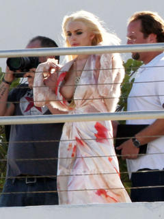 Lindsay Lohan boob out in Miami