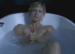 Alexia Barlier naked in a bathtub in