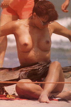 Alessandra Pesaturo topless on a beach