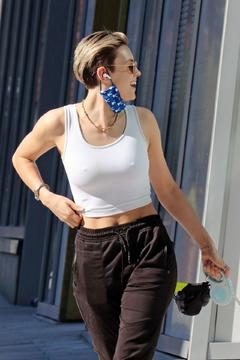 Wallis Day pokies while out with her dog in Vancouver