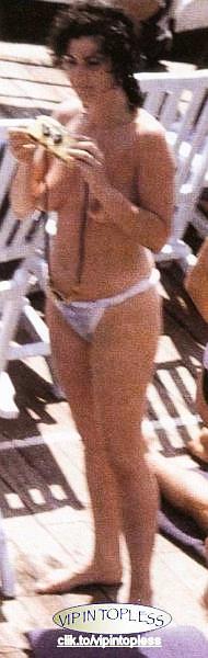 Marisa Laurito topless on a beach