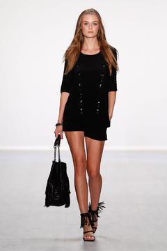 Signe Rasmussen in black dress runway photo