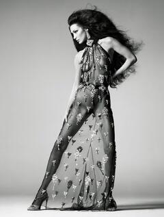 Bella Hadid braless in see through dress for Vogue, UK - June 2025