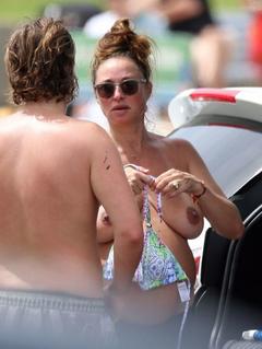 Camilla Franks changing in public shows her nude boobs