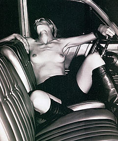 Kim Iglinsky topless in a car