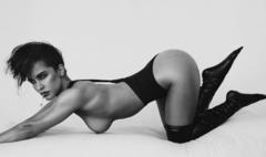 Ellie Gonsalves smoking topless black-&-white photo