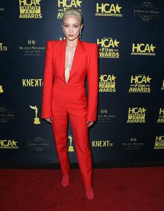 Pom Klementieff braless in red at HCA Film Awards in Beverly Hills - February 2023