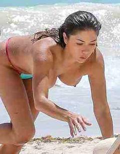 Arianny Celeste topless on a beach