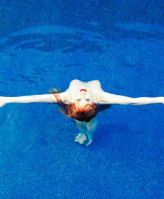 Kathy Griffin topless in a water