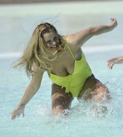 Kerry Katona cleavage in yellow swimsuit in Spain