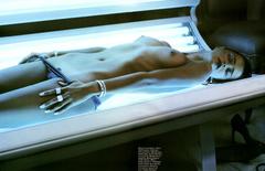 Carmen Kass topless in tanning machine