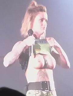 German singer Jennifer Weist from Jennifer Rostock exposed her nude boobs on a stage