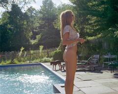 Shannan Click bottomless shows her bare ass poolside