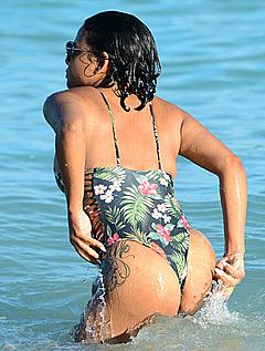 Christina Milian sexy ass in bathing suit on a beach