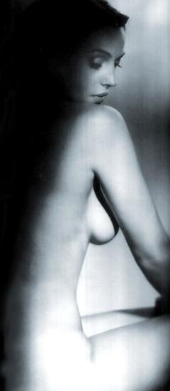 Monica Bellucci sitting naked