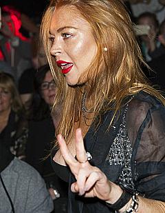 Lindsay Lohan nipple slip at the Gareth Pugh Show at London Fashion Week in London