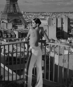Nina Dobrev topless on a balcony in Paris