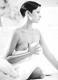 Carey Lowell nude boob