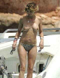 Arancha de Benito topless on a yacht paparazzi photo