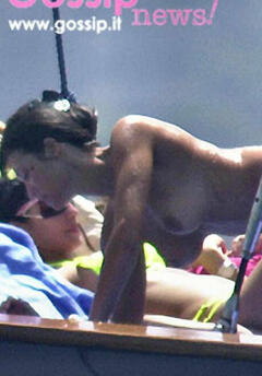 Manuela Arcuri topless on a yacht paparazzi photo
