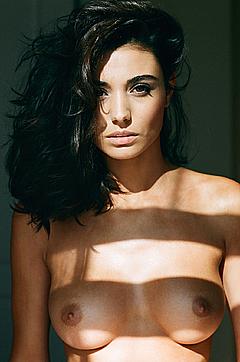 Brunette Melina Dimarco nude breasts