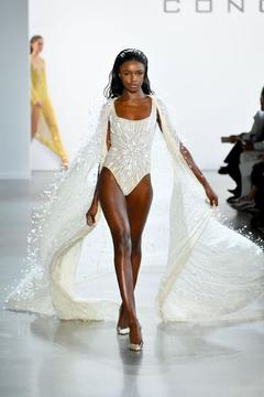 Leomie Anderson walking the runway for Cong Tri during NYFW