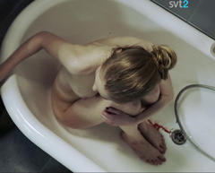 Linda Tuomenvirta nude in a bathtub scene from Raja