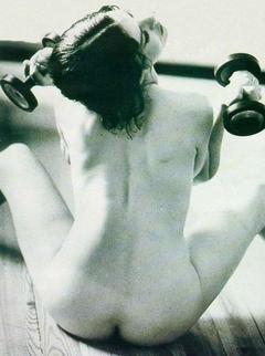 Eva Grimaldi sitting naked