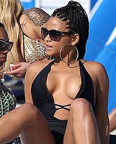 Christina Milian areola slip on a beach