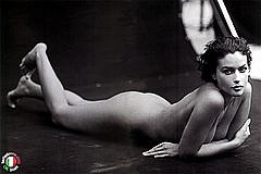 Monica Bellucci lying naked