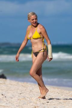Rose McGowan in a bikini at a beach in Tulum