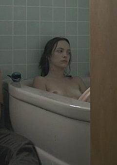 Jodi Balfour nude in a bathtub scene from Quarry