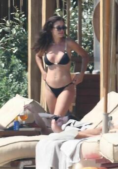 Amy Jackson in black bikini at the Güvercinlik Lujo Hotel in Bodrum, Turkey - July 2023