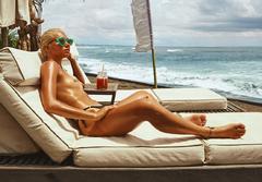 Mel Palummo sunbathing topless for Enki Eyewear