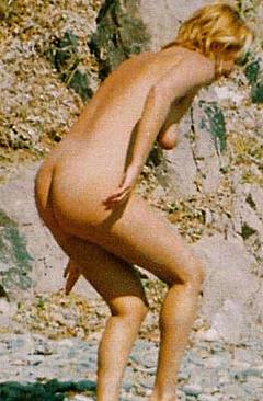Emma Thompson caught nude on a beach