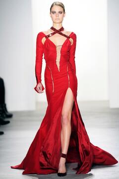 Constance Jablonski walks runway in red dress