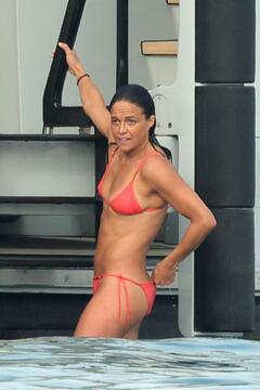 Michelle Rodriguez in a red bikini on a yacht in Porto Cervo - July 2023