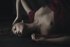 Tiiu Kuik lying topless