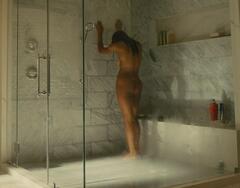 Zoe Saldana naked under shower at Lioness s03e01 (2026)