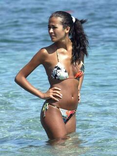 Giorgia Palmas in bikini on a beach