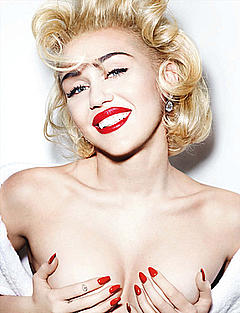 Miley Cyrus grab her nude tits