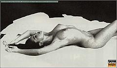 Monica Bellucci lying fully nude