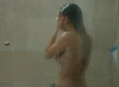 Elisa Mouliaa nude in a shower at Rabia