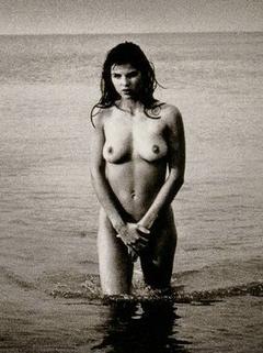 Caroline Barclay nude in a water cover her pussy