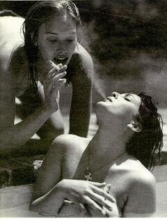 Drew Barrymore topless in a pool