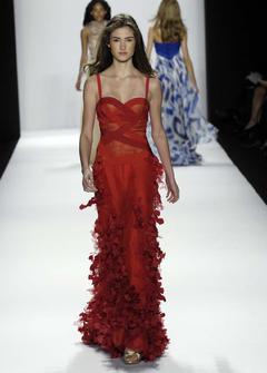 Camilla Finn in red dress runway image