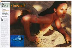 Amanda Beard topless on a sand
