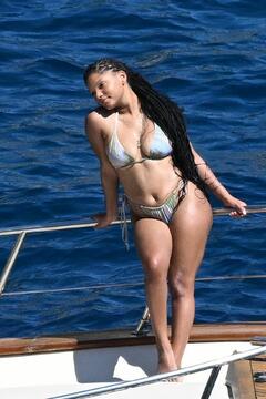 Halle Bailey in skimpy bikini enjoys a sun-soaked swim on the yacht in Positano - June 2025